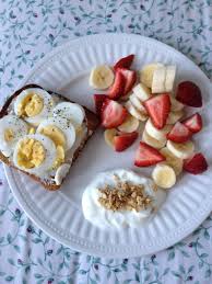 Breakfast Multigrain Toast With One Light Laughing Cow Cheese And Sliced Hard Boiled Egg Fruit Salad Vanilla Greek Yogur Healty Food Yogurt And Granola Food
