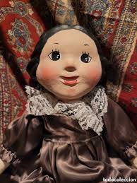 muñeca de cartón piedra y trapo