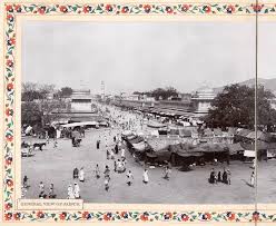 General view of Jaipur ca. 1905 Two prints juxtaposed to form a panorama. Showing a market place in the foreground and buildings in the distance. Jaipur was founded in 1727 by Maharaja