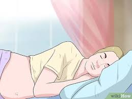 La presenza del bambino che esercita pressione sull'addome valuta di acquistare un cuscino speciale per la gravidanza. 3 Modi Per Dormire Durante La Gravidanza Wikihow