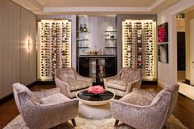 This modern style wine cellar has floor to ceiling glass panels on two walls. Stunning Wine Rooms And Displays Wine Cellar Design Ideas
