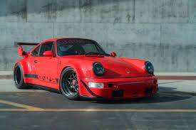 Turbocharged Porsche 911 Rwb Shows Off Its Curves In Auction Carscoops Porsche 911 1989 Porsche 911 Custom Porsche