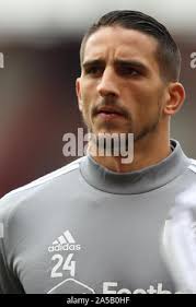 In this Oct. 24, 2019, photo, U.S. service members load military equipment  from an aircraft cargo loader onto a plane at the Kobani Landing Zone  (KLZ), Syria. Pivoting from the dramatic killing