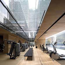 Domani S Light Colored Sky Club House In China Manifests A Simple And Vital Atmosphere Gym Interior Gym Design Home Gym Design