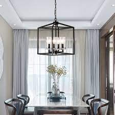 Gurganus 4 Light Lantern Square Rectangle Chandelier With Wrought Iron Accents Chandelier In Living Room Square Chandelier Chandelier Lighting Fixtures