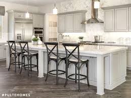 A Kitchen Designed For You To Multitask A Large Island Adds Form And Function By Creating A Space For Your Family Log Home Kitchens Pulte Homes Kitchen Design