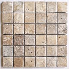 Use this rustic and natural wall tile to create a stunning travertine backsplash or floor. 2x2 Walnut Tuscany Tumbled Travertine Mosaic Tile