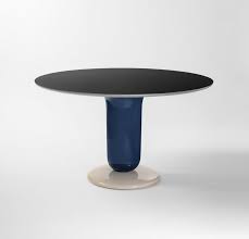 Convertible coffee tables that can be raised to dining height, with or without the option of an expanding surface area. Explorer Dining Table By Jaime Hayon For Bd Barcelona