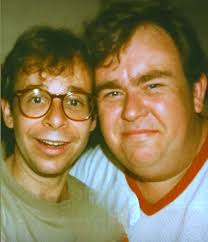 Challenge #5: Find a picture of John playing a musical instrument.