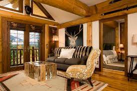 Sheer bed curtains, a striped headboard, patterned pillows, and a formal chaise. Mountain Modern Living Room Grace Home Design Rustic Living Room Other By Frame Design Co Houzz