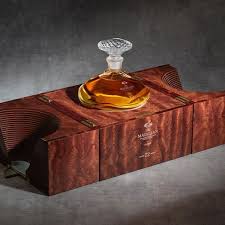 Introducing The The Oldest Macallan Single Malt Ever Released The Macallan 72 Years Old Genesis Sealed Away In Lalique It Is A Celebration In 2019 Bottle Design Decorative Boxes Bottle