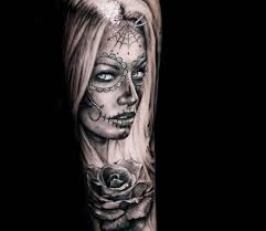 Bamboo plant tattoo symbolizing youth and strength, and protection. La Muerte Tattoo Meaning