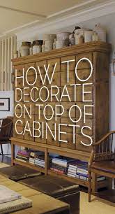 How To Decorate The Top Of A Cabinet And How Not To Designed Cabinet Decor Home Goods Decor Decor