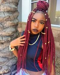 Black Box Braids With Color Tips Trendy Fall Hair Colors Your Best Autumn Hair Color Guide Woman With Bright Red Box Braids Trendy Fall Hair Color Hair Color Guide Red Box Braids