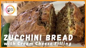 When the flour is almost all incorporated, fold in the zucchini and nuts. Zucchini Bread With Cream Cheese Filling Youtube