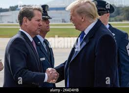 President Donald J. Trump is greeted by U.S. Air Force personnel Col. Brian  Lehew and CMSgt. Judith McGrath after disembarks Air Force One Wednesday,  Oct. 21, 2019, at Pittsburgh International Airport in