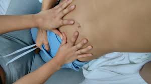 Pressing on full bladder - ThisVid.com