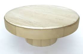 Faux travertine and champagne finish brings an air of elegance to your lounge area. French Cream Leather And Travertine Marble Round Coffee Table At 1stdibs