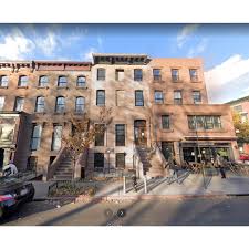 We have a giant white brick wall in the living room that we almost covered up with a huge photo of an my parents did something very cool, they built a passive solar home they designed on top of a hill with. District News Archives Myrtle Avenue Brooklyn Partnership