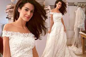 George clooney and amal alamuddin are husband and wife! Amal Alamuddin Fairytale Comes True In Behind The Scenes Shots Of Her Wedding Dress Fitting With Oscar De La Renta Mirror Online