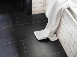 This collection of different colours will give you a sleek, minimalist look or a warmer, more welcoming feel, depending on your personal preference. Large Scale Black Tile Flooring In Contemporary Master Bathroom Hgtv