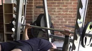 Use the smith machine incline bench press with safety pins locked in place if you have to press a heavy weight and you do not have a spotter for safety. Machine Bench Press Stock Footage Royalty Free Stock Videos Pond5