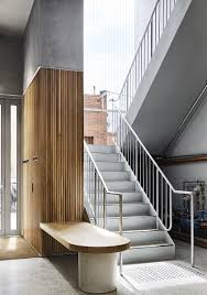 Sitting Amongst A Sea Of Industrial Neighbours Lightbox Is A Fresh And Welcome Addition To The Commerical Fabric Staircase Design Interior Stairs House Design