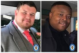 Man charged with murders of two men found in car