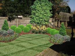 Easy tips and steps we took to turn a boring fence corner into a cute little garden! Backyard Corner Garden Novocom Top