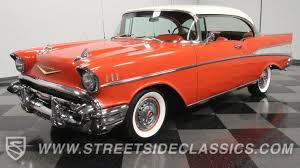 Image result for Orange Red 1957 Motorcycle