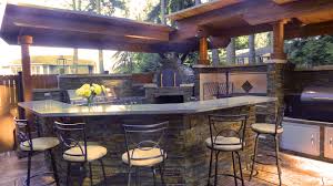 outdoor kitchen with argentinian grill