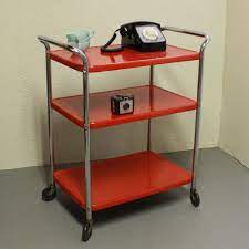 If you grew up with an antique favorite toy and/or had your eyes on a particular favorite doll or car printed in a magazine, viewed in a newspaper, or seen on television, here is some information to help you procure your favorite collectible toys. Vintage Metal Cart Serving Cart Kitchen Cart Cosco Red Wheels 3 Shelf Metal Cart Metal Kitchen Dining Room Updates