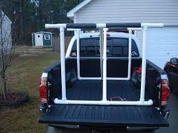 This diy kayak rack will create more room inside your garage. Cheap Or Diy Kayak Rack Help Need To Get A 13ft Yak In A Pickup Texags Kayak Rack Diy Kayak Rack Kayak Rack For Truck