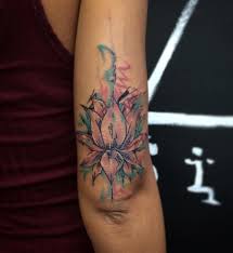 Lower arm lotus tattoo, styled in watercolor technique.something tattoo studio:ruko cordoba, blok d no. 49 Watercolor Lotus Tattoos Ideas Sarcasm Co