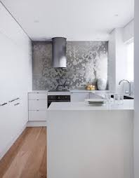 Take It To The Ceiling The Full Wall Backsplash Abode Kitchen Backsplash Trends Modern Kitchen Backsplash Kitchen Design Small