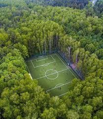 Drone Shot Of A Soccer Field In The Middle Of The Woods In Moscow Football Pitch Soccer Football Soccer