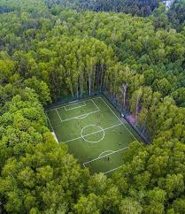 Designed by maclennan jaunkalns miller architects for the city of brampton. Drone Shot Of A Soccer Field In The Middle Of The Woods In Moscow Football Pitch Soccer Soccer Field