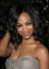 Let your curls as it is but style it with a few twists pinned at the back. Zoe Saldana Hairstyles Styles Weekly