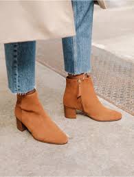 They have a moustache detail on the back of the shoe, more subtle on some shoes than others. The 20 Affordable French Shoe Brands French Girls Love French Shoe Brands French Shoes Mid Heel Boots
