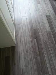 This is because as well as cutting the first and last plank along the top, you are most likely going to have to cut the planks along their whole width. Trafficmaster Allure Plus 5 In X 36 In Grey Maple Luxury Vinyl Plank Flooring 22 5 Sq Ft Case 97514 The Home Depot Vinyl Plank Flooring Luxury Vinyl Plank Flooring Luxury Vinyl Plank