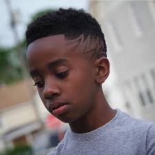 An ideal haircut for black boys with naturally curly hair and small square shaped faces. 35 Popular Haircuts For Black Boys 2021 Trends