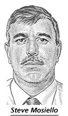 Firefighter Mourns Loss of Chief And Best Friend at Trade Center