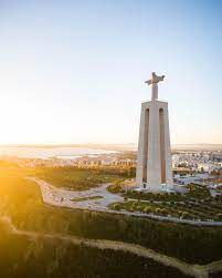 the santuario nacional de cristo rei lisboa is a massive 110 meters high statue of jesus travel inspiration destinations cool places to visit portugal travel