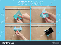 Hier findet ihr faltanleitungen zum papierfalten. Making Phone Holder A4 Cardboard Origami Stock Photo Edit Now 1741576550