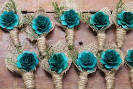 To make a bridal bouquet, choose the color theme and flowers, remove all greenery from the flowers, start with the largest bloom in the center and spiral. Dark Teal Boutonnieres Teal Bouquet Turquoise Wedding Burlap Wedding