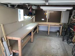 If you want to add a lower shelf, pick up two 1 x 2 x 8s and a 2x4' quarter sheet of 3/4 plywood or mdf. Just Finished Building This One In My Tiny Garage Workbenches