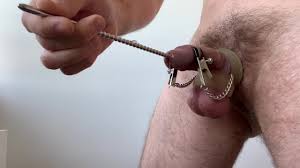 self CBT: ball stretcher, whip, clamps & chains, penisplug