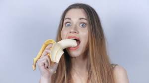Bananas are high in potassium and riboflavin, which increase the body's energy levels, so that makes them a great snack to eat before a workout. 71 Woman Lips Banana Stock Videos Royalty Free Woman Lips Banana Footage Depositphotos