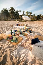 Friendsgiving Beach Picnic Featuring Long Grazing Table By Slate Catering Redwood Table Rental By All Heart In 2020 Beach Picnic Beach Picnic Party Picnic Inspiration