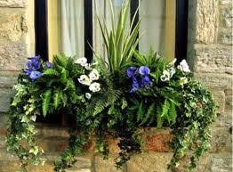 Designed for outdoor decoration, these lifelike flowers lend gorgeous charm to your front porch, walkway, patio, and garden. Fake Flowers In Window Boxes Fake Flowers Window Box Flowers Flower Boxes